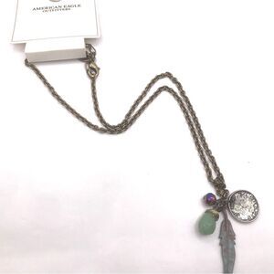 American Eagle Outfitters Brass and Green Feather Pendant Necklace